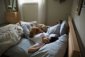 Woman sleeping in bed